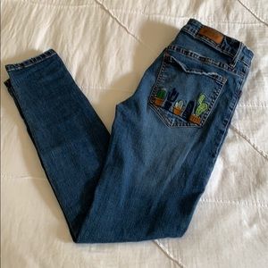 Blue skinny jeans with cactus pocket